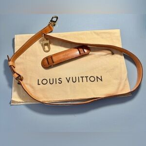 Authentic Louis Vuitton shoulder strap with shoulder pad and dust bag.